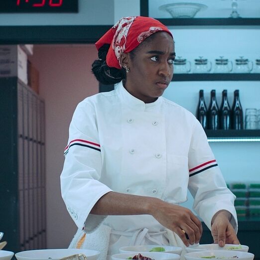 Still of actor Ayo Edebiri preparing dishes from The Bear, Season 2 Episode 10, audition, self-tapes, character